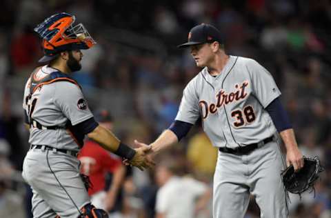 MINNEAPOLIS, MN – JULY 21: Alex Avila #31 and Justin Wilson #38 of the Detroit Tigers celebrate winning the game against the Minnesota Twins on July 21, 2017 at Target Field in Minneapolis, Minnesota. The Tigers defeated the Twins 6-3. (Photo by Hannah Foslien/Getty Images)