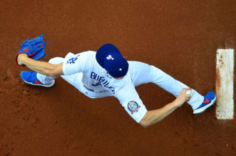 LOS ANGELES, CA – JUNE 08: Walker Buehler #21 of the Los Angeles Dodgers warms up in the bullpen before the start of the game against the Atlanta Braves at Dodger Stadium on June 8, 2018 in Los Angeles, California. (Photo by Jayne Kamin-Oncea/Getty Images)