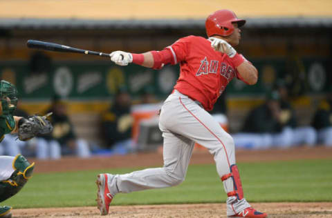 OAKLAND, CA – JUNE 15: Jose Fernandez #20 of the Los Angeles Angels of Anaheim hits an rbi single scoring Justin Upton #8 against the Oakland Athletics in the top of the third inning at the Oakland Alameda Coliseum on June 15, 2018 in Oakland, California. (Photo by Thearon W. Henderson/Getty Images)