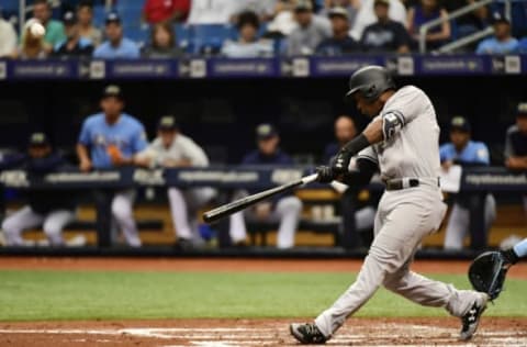 ST PETERSBURG, FL – JUNE 24: Miguel Andujar #41 of the New York Yankees hits a three-run home run in the third inning against the Tampa Bay Rays on June 24, 2018 at Tropicana Field in St Petersburg, Florida. (Photo by Julio Aguilar/Getty Images)