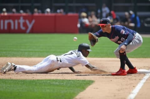 CHICAGO, IL – JUNE 28: Tim Anderson #7 of the Chicago White Sox dives back to first base ahead of the throw to Logan Morrison #99 of the Minnesota Twins in the 3rd inning at Guaranteed Rate Field on June 28, 2018 in Chicago, Illinois. (Photo by Jonathan Daniel/Getty Images)