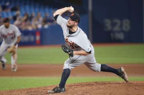 TORONTO, ON – JUNE 30: Alex Wilson #30 of the Detroit Tigers delivers a pitch in the eighth inning during MLB game action against the Toronto Blue Jays at Rogers Centre on June 30, 2018 in Toronto, Canada. (Photo by Tom Szczerbowski/Getty Images)