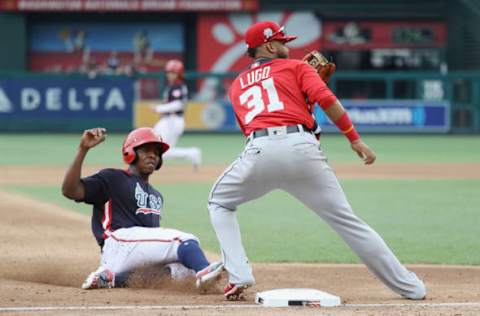 WASHINGTON, DC – JULY 15: Ke’Bryan Hayes #10 of the Pittsburgh Pirates and the U.S. Team slides into third base in front of Dawel Lugo #31 of the Detroit Tigers and the World Team in the third inning during the SiriusXM All-Star Futures Game at Nationals Park on July 15, 2018 in Washington, DC. (Photo by Rob Carr/Getty Images)