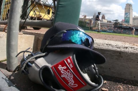 DETROIT, MI – JUNE 28: A Detroit Tigers hat, glasses and glove sit on the dugout stairs during a MLB game against the Chicago White Sox at Comerica Park on June 28, 2015 in Detroit, Michigan. The Tigers win on a walk off home run 5-4. (Photo by Dave Reginek/Getty Images)