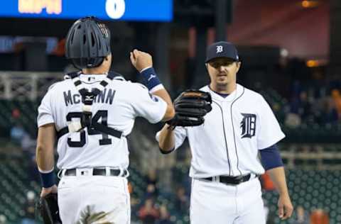 DETROIT, MI – APRIL 25: Blaine Hardy #36 of the Detroit Tigers is congratulated by catcher James McCann #34 of the after a MLB game against the Seattle Mariners at Comerica Park on April 25, 2017 in Detroit, Michigan. The Tigers defeated the Mariners 19-9. (Photo by Dave Reginek/Getty Images)