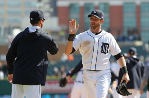 DETROIT, MI – APRIL 12: Manager Brad Ausmus #7 of the Detroit Tigers congratulated Andrew Romine #17 after the win over the Minnesota Twins on April 12, 2017 at Comerica Park in Detroit, Michigan. The Tigers defeated the Twins 5-3. (Photo by Leon Halip/Getty Images)