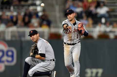 MINNEAPOLIS, MN – JULY 21: Ian Kinsler #3 of the Detroit Tigers gets out of the way as teammate Jose Iglesias #1 as he throws to first base to get out Joe Mauer #7 of the Minnesota Twins during the seventh inning of the game on July 21, 2017 at Target Field in Minneapolis, Minnesota. The Tigers defeated the Twins 6-3. (Photo by Hannah Foslien/Getty Images)