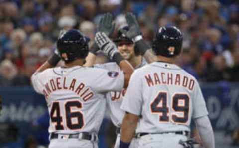 TORONTO, ON – SEPTEMBER 8: Nick Castellanos #9 of the Detroit Tigers is congratulated by Jeimer Candelario #46 and Dixon Machado #49 after hitting a grand slam home run in the third inning during MLB game action against the Toronto Blue Jays at Rogers Centre on September 8, 2017 in Toronto, Canada. (Photo by Tom Szczerbowski/Getty Images)