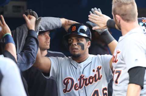 TORONTO, ON – SEPTEMBER 9: Jeimer Candelario #46 of the Detroit Tigers is congratulated by teammates in the dugout after scoring a run in the ninth inning during MLB game action against the Toronto Blue Jays at Rogers Centre on September 9, 2017 in Toronto, Canada. (Photo by Tom Szczerbowski/Getty Images)