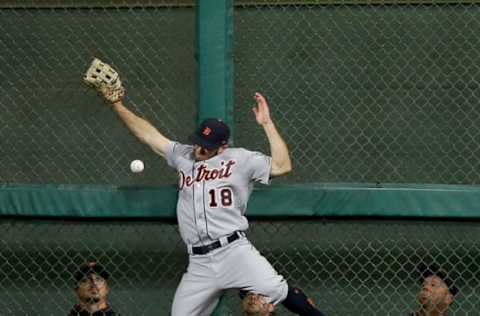 HOUSTON, TX – MAY 25: Tyler Collins #18 of the Detroit Tigers leaps at the wall but has the ball go off the palm of his glove on a deep fly off the bat of Evan Gattis of the Houston Astros in the fifth inning at Minute Maid Park on May 25, 2017 in Houston, Texas. (Photo by Bob Levey/Getty Images)