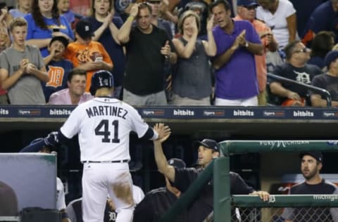 DETROIT, MI – JULY 5: Victor Martinez #41 of the Detroit Tigers receives a high-five from manager Brad Ausmus #7 of the Detroit Tigers after scoring against the San Francisco Giants on a single by Ian Kinsler #3 of the Detroit Tigers during the seventh inning at Comerica Park on July 5, 2017 in Detroit, Michigan. (Photo by Duane Burleson/Getty Images)