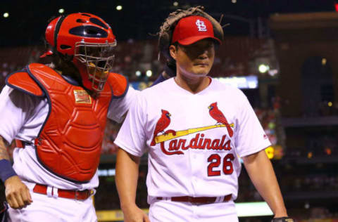 ST. LOUIS, MO – JULY 28: Yadier Molina #4 of the St. Louis Cardinals congratulates Seung-Hwan Oh #26 of the St. Louis Cardinals after Ho pitched out of a run-scoring situation against the Arizona Diamondbacks in the seventh inning at Busch Stadium on July 28, 2017 in St. Louis, Missouri. (Photo by Dilip Vishwanat/Getty Images)