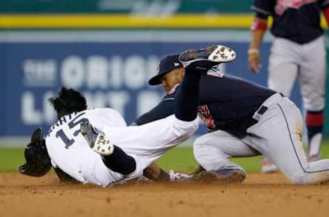 DETROIT, MI – SEPTEMBER 2: Mikie Mahtook #15 of the Detroit Tigers dives into second base to beat the tag from second baseman Jose Ramirez #11 of the Cleveland Indians for a double during the seventh inning at Comerica Park on September 2, 2017 in Detroit, Michigan. (Photo by Duane Burleson/Getty Images)