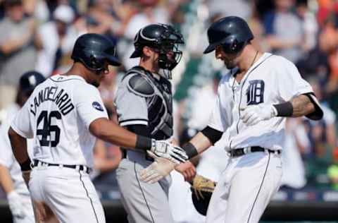 DETROIT, MI – SEPTEMBER 17: Nicholas Castellanos #9 of the Detroit Tigers celebrates with Jeimer Candelario #46 of the Detroit Tigers as he crosses the plate in front of catcher Rob Brantly #44 of the Chicago White Sox after hitting a two-run home run during the sixth inning at Comerica Park on September 17, 2017 in Detroit, Michigan. (Photo by Duane Burleson/Getty Images)