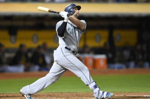 OAKLAND, CA – SEPTEMBER 26: Yonder Alonso #10 of the Seattle Mariners swings and watches the flight of his ball as he hits a two-run homer against the Oakland Athletics in the top of the fourth inning at Oakland Alameda Coliseum on September 26, 2017 in Oakland, California. (Photo by Thearon W. Henderson/Getty Images)