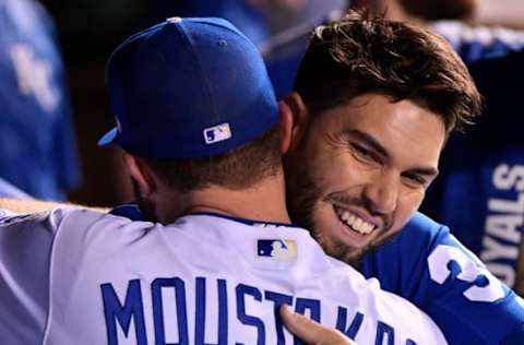 KANSAS CITY, MO – SEPTEMBER 30: Mike Moustakas #8 of the Kansas City Royals receives a hug from Eric Hosmer #35 after he was taken out of a game against the Arizona Diamondbacks in the sixth inning at Kauffman Stadium on September 30, 2017 in Kansas City, Missouri. (Photo by Ed Zurga/Getty Images)