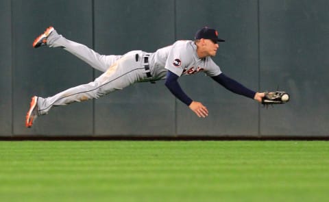 MINNEAPOLIS, MN – SEPTEMBER 30: JaCoby Jones #40 of the Detroit Tigers makes a diving attempt but was unable to catch a hit by Ehire Adrianza #16 of the Minnesota Twins in the seventh inning during of their baseball game on September 30, 2017, at Target Field in Minneapolis, Minnesota.(Photo by Andy King/Getty Images)