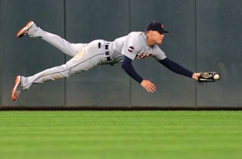 MINNEAPOLIS, MN – SEPTEMBER 30: JaCoby Jones #40 of the Detroit Tigers makes a diving attempt but was unable to catch a hit by Ehire Adrianza #16 of the Minnesota Twins in the seventh inning during of their baseball game on September 30, 2017, at Target Field in Minneapolis, Minnesota.(Photo by Andy King/Getty Images)