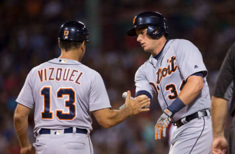 BOSTON, MA – JULY 25: James McCann #34 of the Detroit Tigers celebrates his base hit that drove in a run with first base coach Omar Vizquel #13 during the seventh inning against the Boston Red Sox at Fenway Park on July 25, 2016 in Boston, Massachusetts. (Photo by Rich Gagnon/Getty Images)