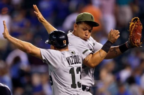 KANSAS CITY, MO – MAY 29: Miguel Cabrera #24 and first base coach Omar Vizquel #13 of the Detroit Tigers celebrate after the Tigers defeated the Kansas City Royals 10-7 to win the game at Kauffman Stadium on May 29, 2017 in Kansas City, Missouri. (Photo by Jamie Squire/Getty Images)