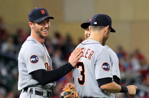 MINNEAPOLIS, MN – SEPTEMBER 30: Andrew Romine #17 of the Detroit Tigers shares a laugh teammates Ian Kinsler #3 and Jose Iglesias #1 after Romine pitched in the eighth inning during of their baseball game on September 30, 2017, at Target Field in Minneapolis, Minnesota.(Photo by Andy King/Getty Images)