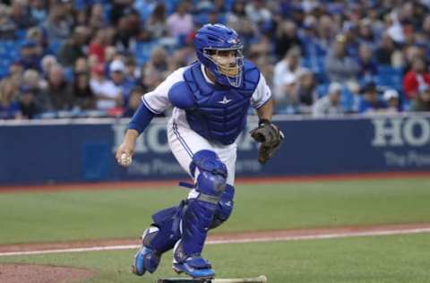 TORONTO, ON – SEPTEMBER 8: Raffy Lopez #1 of the Toronto Blue Jays fields a soft grounder while avoiding stepping on the bat as he makes the play and throws out the baserunner in the second inning during MLB game action against the Detroit Tigers at Rogers Centre on September 8, 2017 in Toronto, Canada. (Photo by Tom Szczerbowski/Getty Images)