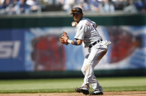 Shortstop Carlos Guillen of the Detroit Tigers prepares to throw to first base during action on opening day against the Kansas City Royals at Kauffman Stadium in Kansas City, MO on April 3, 2006. (Photo by G. N. Lowrance/Getty Images)