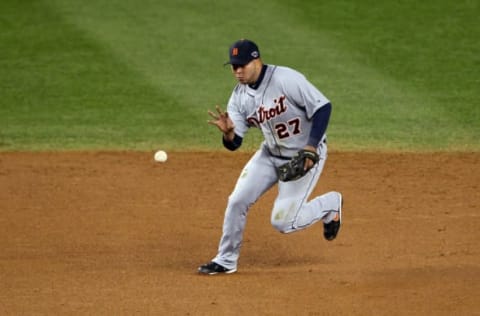 NEW YORK, NY – OCTOBER 13: Jhonny Peralta #27 of the Detroit Tigers barehands a ball he fields against the New York Yankees during Game One of the American League Championship Series at Yankee Stadium on October 13, 2012 in the Bronx borough of New York City, New York. (Photo by Alex Trautwig/Getty Images)