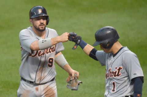 BALTIMORE, MD – JULY 30: Nick Castellanos #9 celebrates scoring a run with Jose Iglesias #1 of the Detroit Tigers on a Rajai Davis #20 (not pictured) triple in the fourth inning during a baseball game against the Baltimore Orioles at Oriole Park at Camden Yards on July 30, 2015 in Baltimore, Maryland. (Photo by Mitchell Layton/Getty Images)