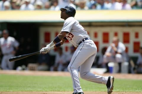 OAKLAND, CA – JULY 5: Marcus Thames #33 of the Detroit Tigers watches the ball take flight from home plate during their game against the Oakland Athletics at McAfee Coliseum on July 5th, 2006 in Oakland, California. (Photo by Jed Jacobsohn/Getty Images)