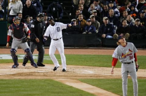 DETROIT – OCTOBER 22: Craig Monroe #27 of the Detroit Tigers hits a solo home run as pitcher Jeff Weaver #36 and catcher Yadier Molina #4 of the St. Louis Cardinals watch the ball fly over the outfield fence during Game Two of 2006 World Series October 22, 2006 at Comerica Park in Detroit, Michigan. (Photo by Gregory Shamus/Getty Images)