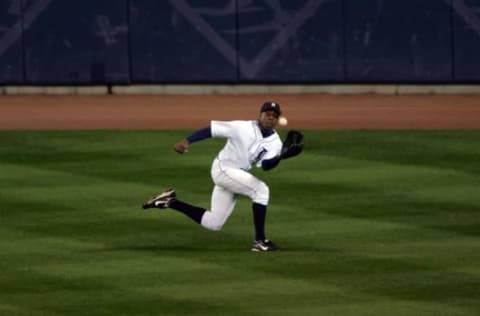 DETROIT – OCTOBER 22: Curtis Granderson #28 of the Detroit Tigers runs down a ball hit by Preston Wilson #3 of the St. Louis Cardinals in the fifth inning during Game Two of 2006 World Series October 22, 2006 at Comerica Park in Detroit, Michigan. (Photo by Jed Jacobsohn/Getty Images)