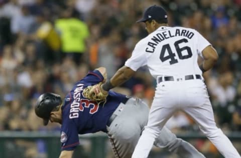 DETROIT, MI – SEPTEMBER 22: Robbie Grossman #36 of the Minnesota Twins is tagged out by third baseman Jeimer Candelario #46 of the Detroit Tigers after getting caught in a rundown between second base and third during the fifth inning at Comerica Park on September 22, 2017 in Detroit, Michigan. (Photo by Duane Burleson/Getty Images)