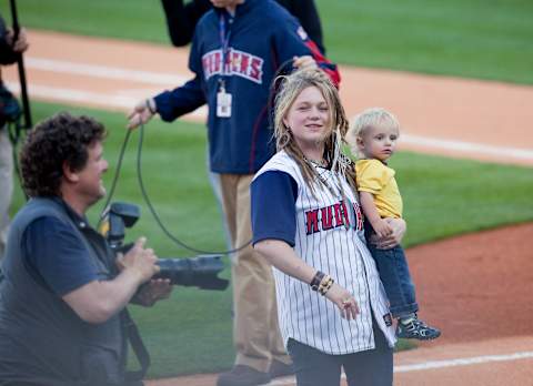 TOLEDO, OH – MAY 14: Crystal Bowersox, holding her 11-month-old son, Tony, attends her ‘American Idol’ homecoming parade and performance at the Fifth Third Field on May 14, 2010 in Toledo, Ohio. (Photo by Joey Foley/Getty Images)