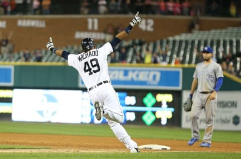 DETROIT, MI – SEPTEMBER 18: Dixon Machado #49 of the Detroit Tigers gets the game winning single in the twelfth inning and celebrate as he rounds the bases during the game against the Kansas City Royals on September 18, 2015 at Comerica Park in Detroit, Michigan. The Tigers defeated the Royals 5-4. (Photo by Leon Halip/Getty Images)