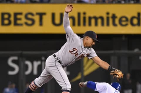 KANSAS CITY, MO – SEPTEMBER 28: Dixon Machado #49 of the Detroit Tigers steps on second as he gets the force out on Lorenzo Cain #6 of the Kansas City Royals in the fourth inning at Kauffman Stadium on September 28, 2017 in Kansas City, Missouri. (Photo by Ed Zurga/Getty Images)