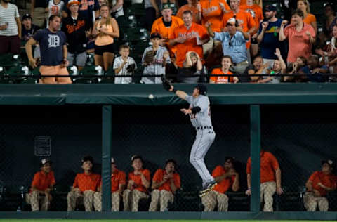 BALTIMORE, MD – AUGUST 04: Jim Adduci #37 of the Detroit Tigers is unable to catch a double hit by Seth Smith #12 of the Baltimore Orioles (not pictured) in the seventh inning during a game at Oriole Park at Camden Yards on August 4, 2017 in Baltimore, Maryland. (Photo by Patrick McDermott/Getty Images)