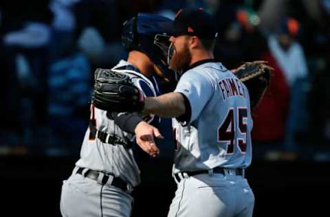 CHICAGO, IL – APRIL 07: James McCann #34 of the Detroit Tigers (L) and Buck Farmer #45 celebrate their win over the Chicago White Sox at Guaranteed Rate Field on April 7, 2018 in Chicago, Illinois. The Detroit Tigers won 6-1. (Photo by Jon Durr/Getty Images)