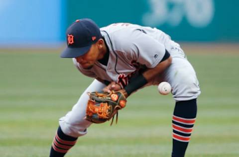 CLEVELAND, OH – APRIL 12: Dixon Machado #49 of the Detroit Tigers commits an error on a ball hit by Tyler Naquin #30 of the Cleveland Indians during the fourth inning at Progressive Field on April 12, 2018 in Cleveland, Ohio. The Indians defeated the Tigers 9-3. (Photo by Ron Schwane/Getty Images)