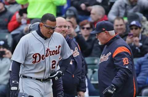 CHICAGO, IL – APRIL 05: Miguel Cabrera #24 of the Detroit Tigers points to where he hurt himself after tripping and falling while running between first and second base to manager Ron Gardenhire #15 in the first inning against the Chicago White Sox during the Opening Day home game at Guaranteed Rate Field on April 5, 2018 in Chicago, Illinois. (Photo by Jonathan Daniel/Getty Images)