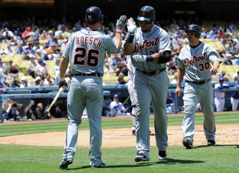 Miguel Cabrera celebrates with teammate Brennan Boesch after hitting a two-run home run in the first inning against the Los Angeles Dodgers at Dodger Stadium on May 23, 2010. (Photo by Lisa Blumenfeld/Getty Images)