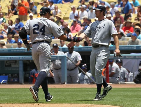 Miguel Cabrera is greeted by Brennan Boesch after Cabrera’s two-run home run in the third inning against the Los Angeles Dodgers on June 22, 2011 at Dodger Stadium. (Photo by Stephen Dunn/Getty Images)