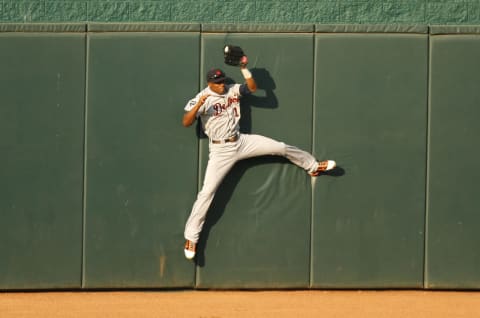 Austin Jackson robs the Royals’ Alex Gordon of a home run in the first inning on August 6, 2011 in Kansas City. (Photo by Ed Zurga/Getty Images)