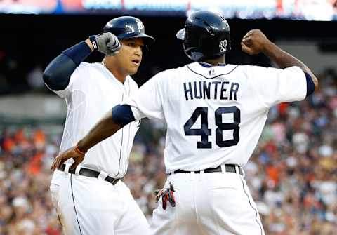 Miguel Cabrera celebrates his fifth-inning, three-run home run against the Red Sox with Torii Hunter on June 21, 2013. (Photo by Gregory Shamus/Getty Images)