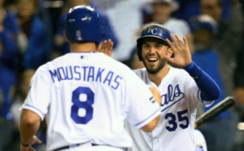 Sep 27, 2017; Kansas City Royals third baseman Mike Moustakas is congratulated by Eric Hosmer. Jay Biggerstaff-USA TODAY Sports