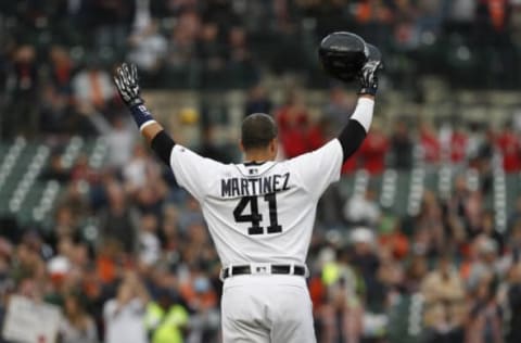 Victor Martinez raises his arms and thanks the crowd as he walks off the field for the last time. Raj Mehta-USA TODAY Sports