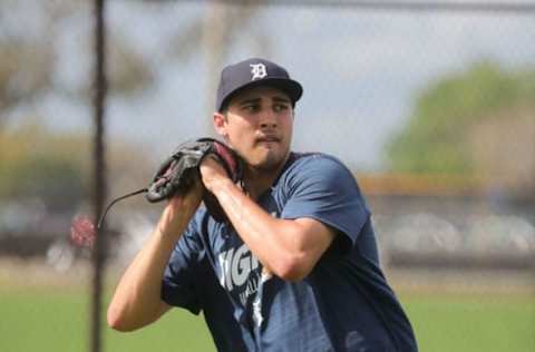 Tigers pitching prospect Alex Faedo warms up during spring training.