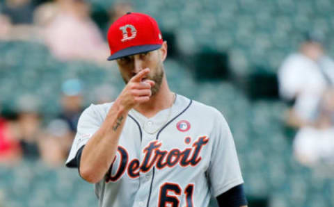 Jul 4, 2019; Chicago, IL, USA; Detroit Tigers relief pitcher Shane Greene gestures towards first base: Jon Durr-USA TODAY Sports