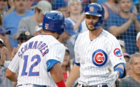 Chicago Cubs right fielder Kris Bryant congratulates left fielder Kyle Schwarber on his home run. Jon Durr-USA TODAY Sports