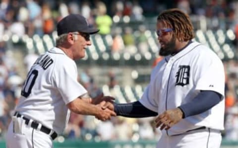 Detroit Tigers manager Jim Leyland congratulates Prince Fielder after the Tigers defeated the Blue Jays.